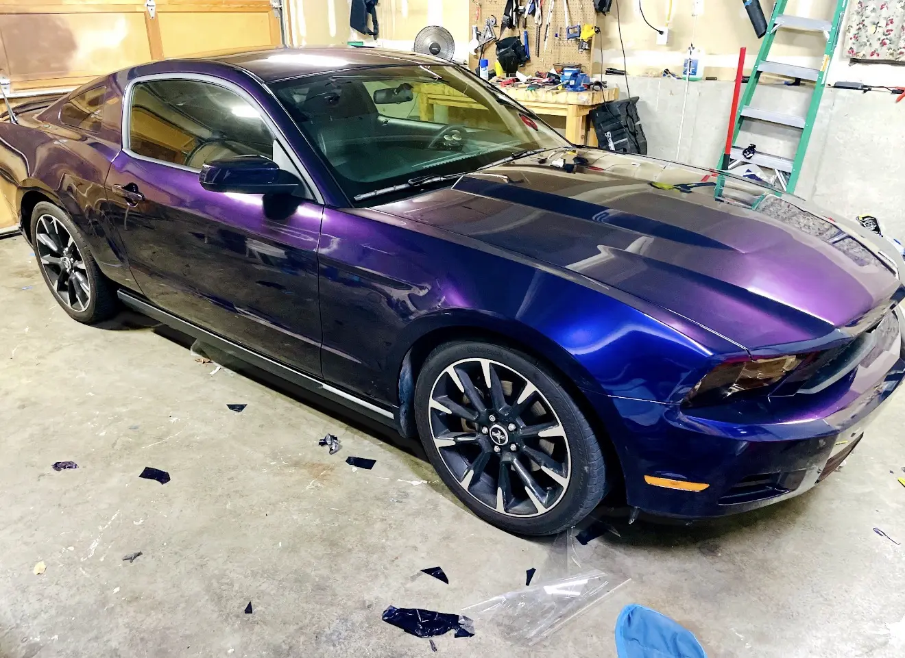 Ford Mustang wrapped in a deep purple color-shift vinyl finish